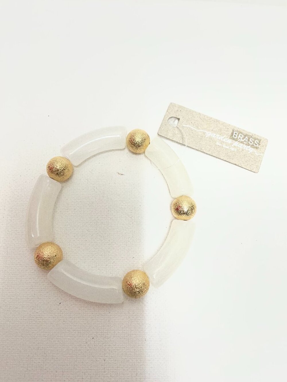 Garden Party Stretch white translucent w/gold balls bracelet